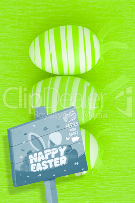 Composite image of easter egg hunt sign