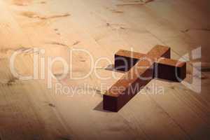 Composite image of wooden cross