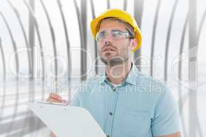 Composite image of supervisor looking away while writing on clip