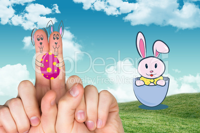 Composite image of fingers as easter bunny