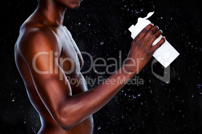 Composite image of mid section of a sporty young man holding pro