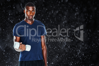 Composite image of portrait of a casual man lifting dumbbells