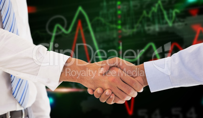 Composite image of close-up shot of a handshake in office