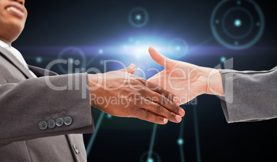 Composite image of businessman going shaking a hand