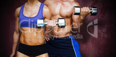 Composite image of bodybuilding couple