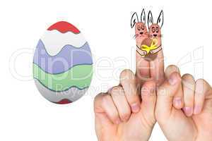 Composite image of fingers as easter bunny