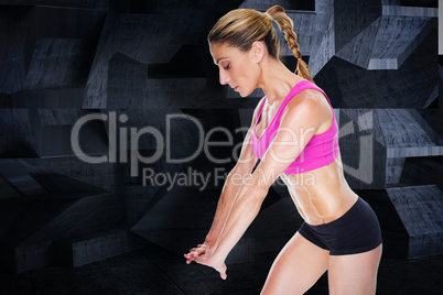 Composite image of female bodybuilder flexing and looking down