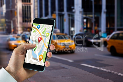 Composite image of man using map app on phone