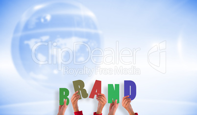 Composite image of hands showing brand