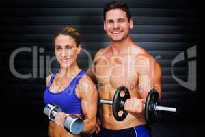 Composite image of bodybuilding couple