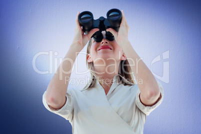 Composite image of businesswoman looking through binoculars