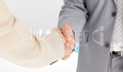 Composite image of people in suit shaking hands