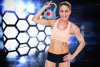 Composite image of female blonde crossfitter holding kettlebell