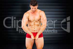 Composite image of attractive bodybuilder