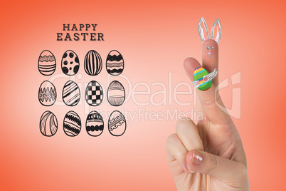 Composite image of fingers as easter bunny