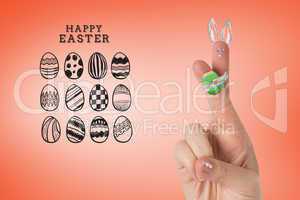 Composite image of fingers as easter bunny