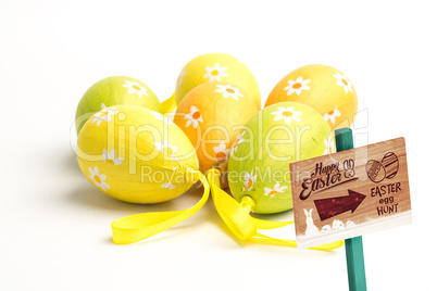 Composite image of easter egg hunt sign