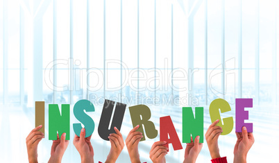 Composite image of hands holding up insurance