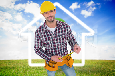 Composite image of smiling handyman holding tape measure