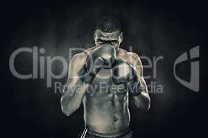 Composite image of muscular boxer