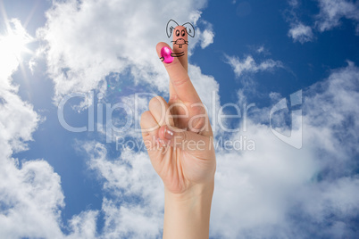 Composite image of fingers as easter bunny