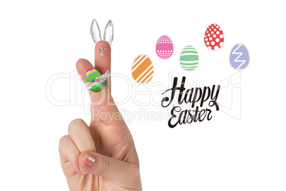 Composite image of fingers as easter bunny