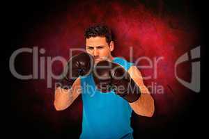Composite image of determined male boxer focused on his training