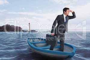 Composite image of businessman in boat