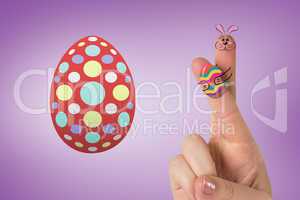 Composite image of fingers as easter bunny