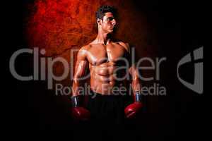 Composite image of muscular boxer