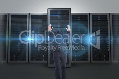 Composite image of businessman standing and pushing with hands Composite image of businessman standing and pushing with hands