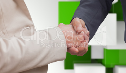 Composite image of business people shaking hands