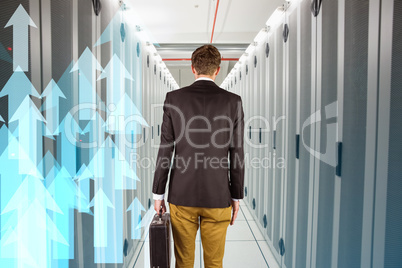 Composite image of young geeky businessman holding briefcase