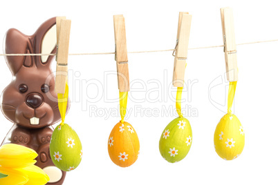 Composite image of hanging easter eggs