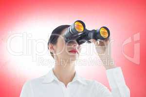 Composite image of business woman  looking through binoculars