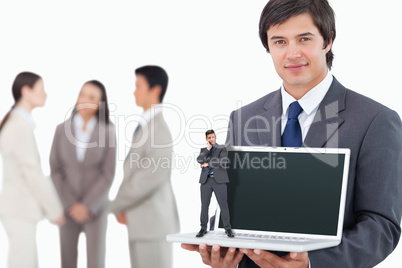 Composite image of thinking businessman