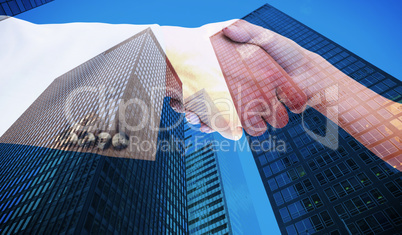 Composite image of close up of female and male hand shaking