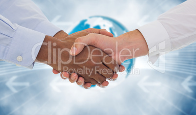 Composite image of close-up shot of a handshake in office