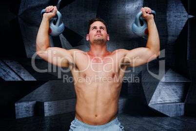 Composite image of bodybuilder holding kettlebells