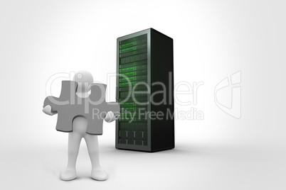 Composite image of white character holding jigsaw piece