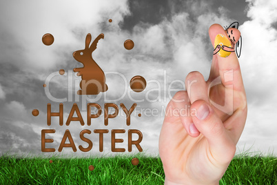 Composite image of fingers as easter bunny