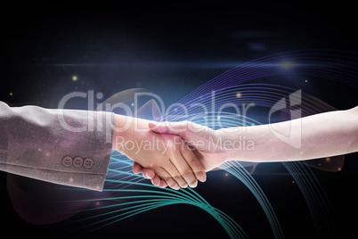 Composite image of handshake between two women