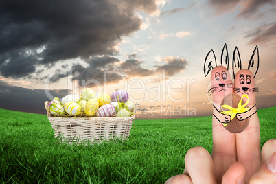 Composite image of fingers as easter bunny