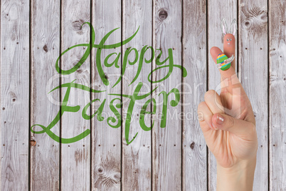 Composite image of fingers as easter bunny