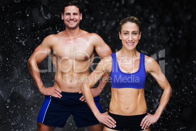 Composite image of bodybuilding couple