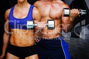 Composite image of bodybuilding couple