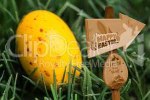 Composite image of easter egg hunt sign