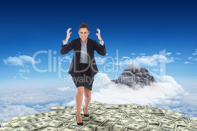 Composite image of angry businesswoman gesturing