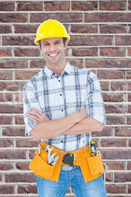 Composite image of technician standing arms crossed over white b