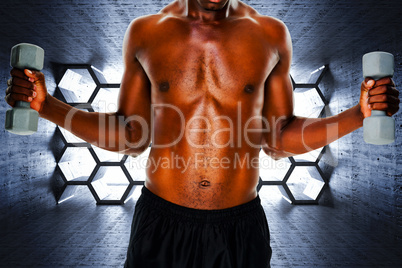 Composite image of mid section of fit shirtless man lifting dumb